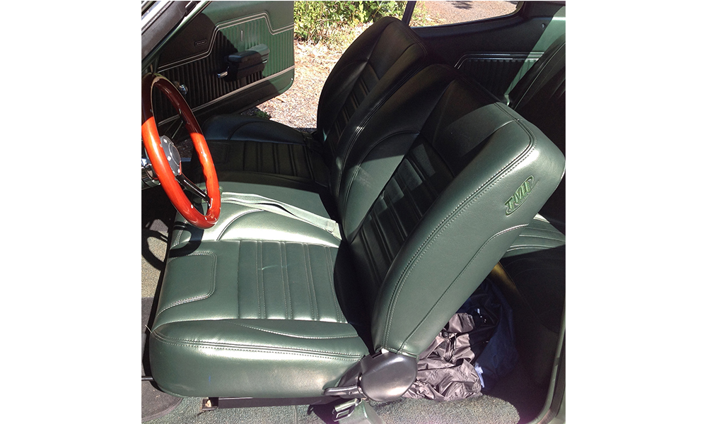 1970 Chevelle featuring replacement standard SPORT bench seats with green vinyl. Includes matching door panels.