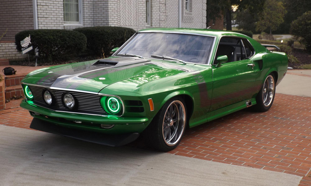 https://www.datocms-assets.com/31486/1609369719-green-mustang-1-1.jpg