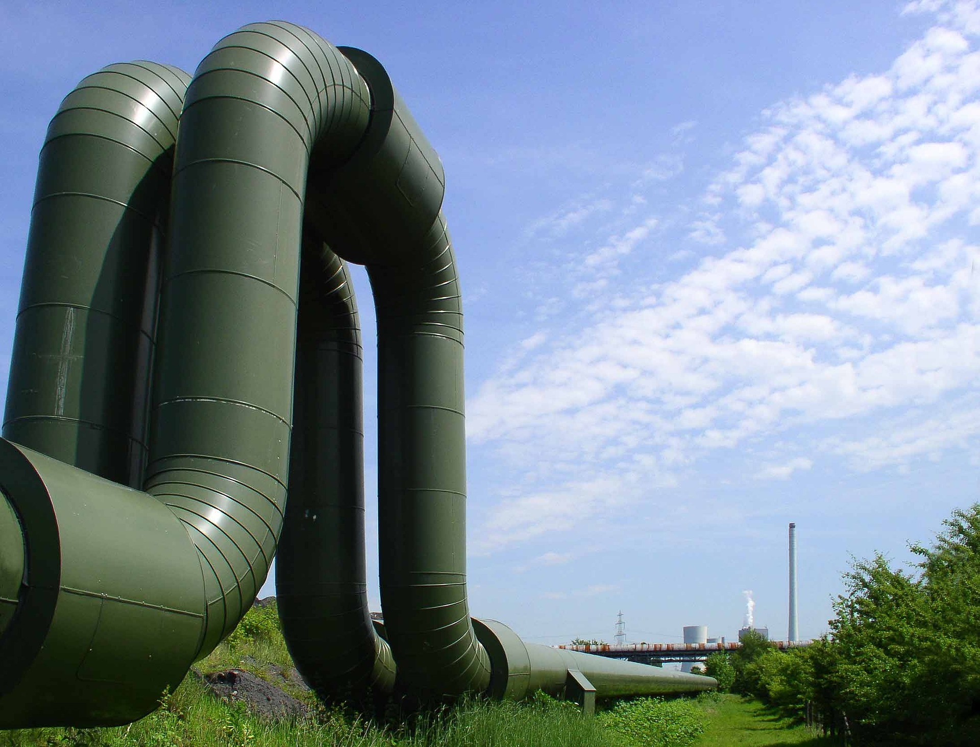 Innovative Thermal-Hydraulic Model for Waste Heat Recovery in District Heating Networks