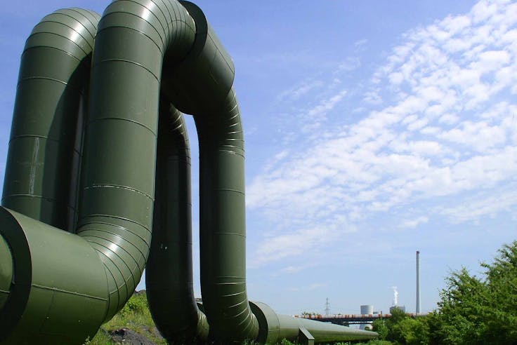 Innovative Thermal-Hydraulic Model for Waste Heat Recovery in District Heating Networks
