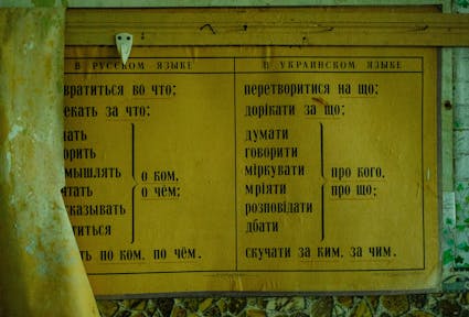 A faded classroom chart comparing Russian and Ukrainian grammar captures Ukraine’s complex linguistic history and the central role of language in today’s debates over identity and security.