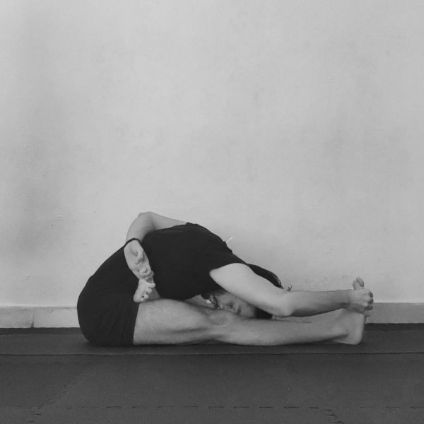 ardha-baddha-padma-paschimottanasana