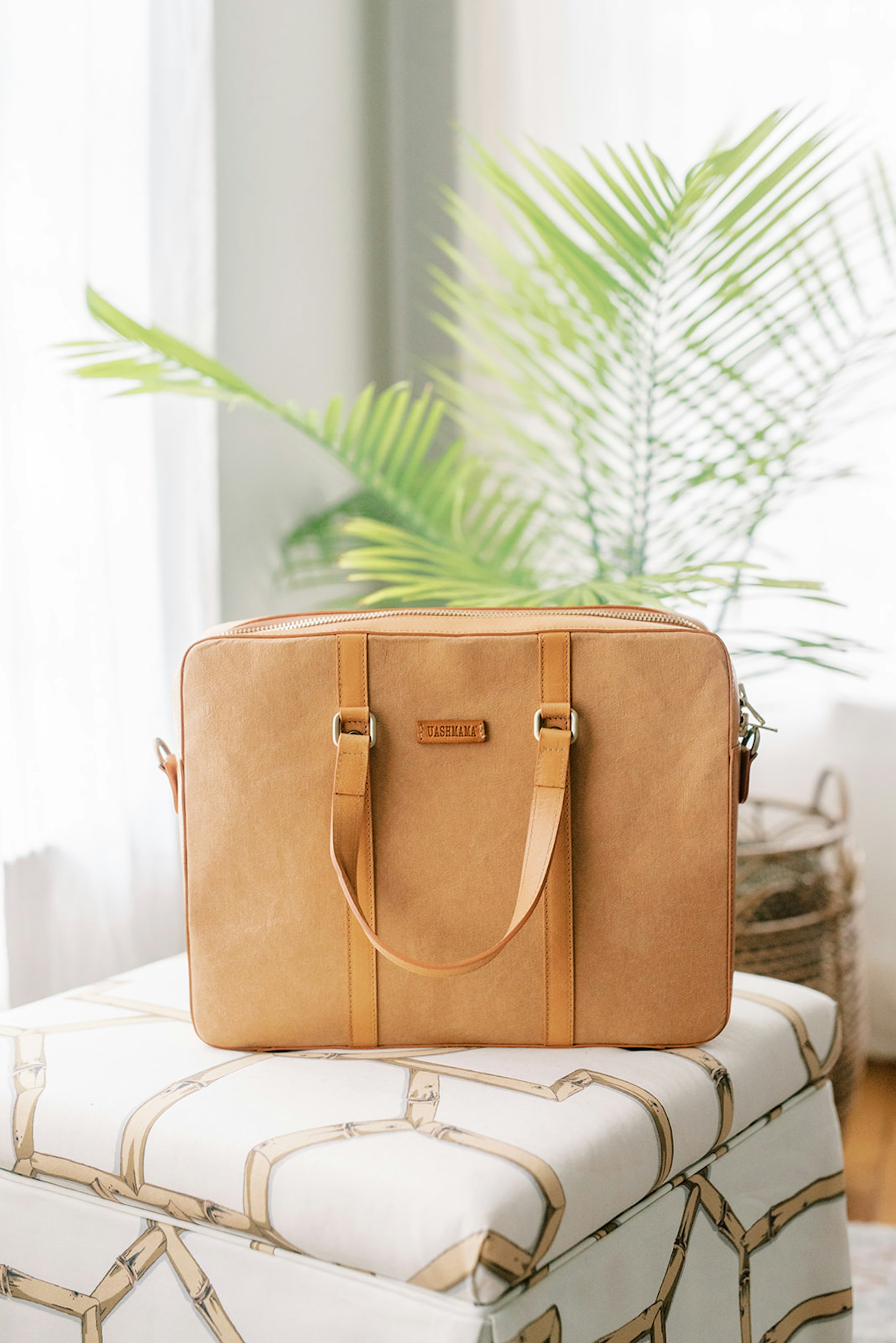 https://www.datocms-assets.com/3179/1617874541-brisbane-bag-uashmama.jpg