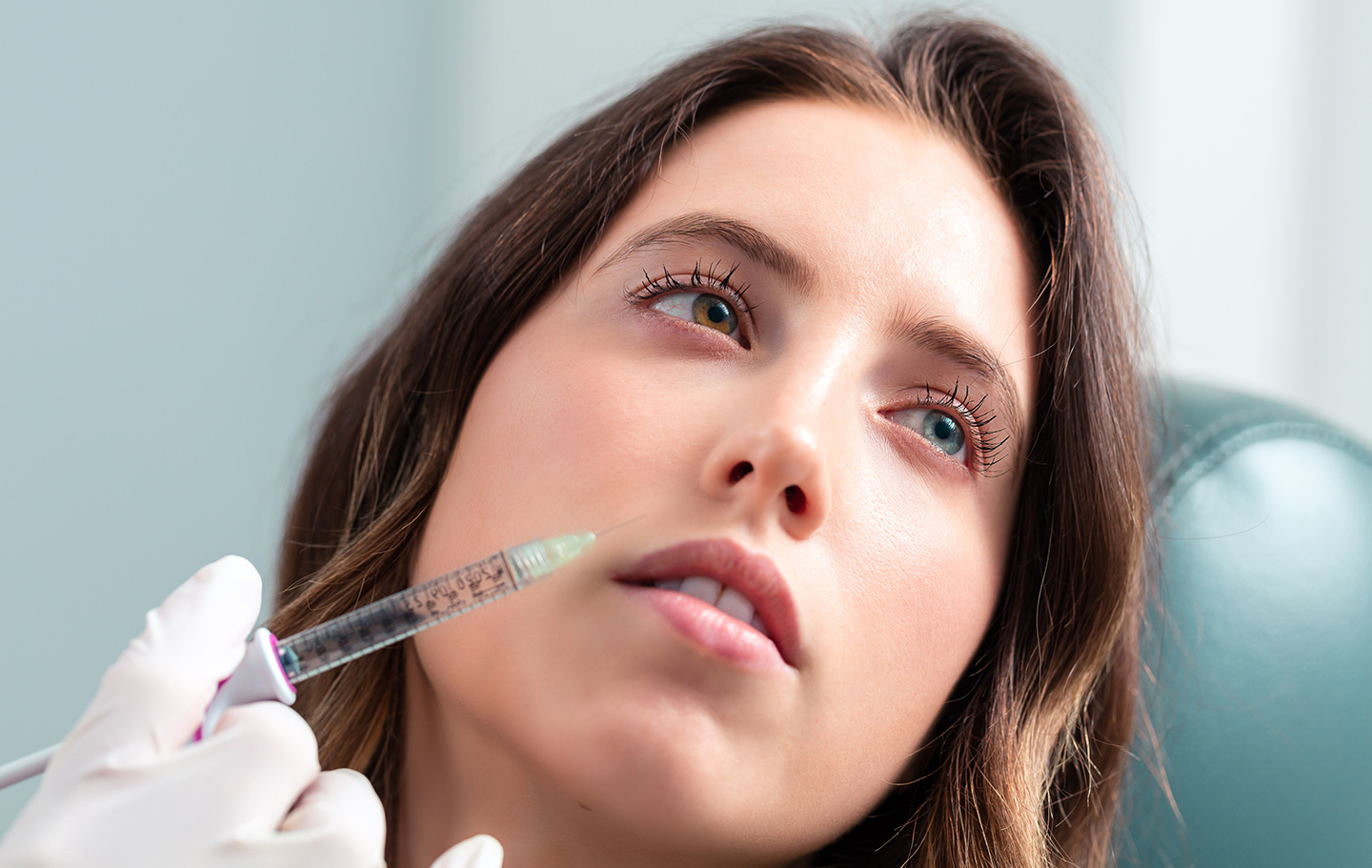 patient getting an injectable by doctor