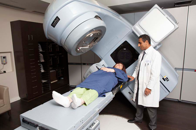 Woman receiving radiation treatment