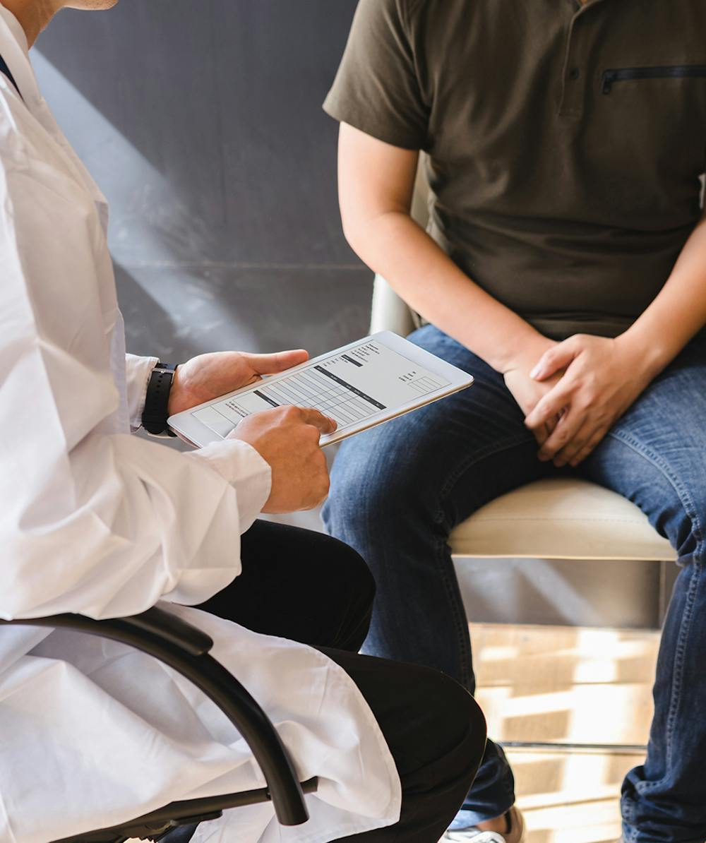 Doctor consulting with patient