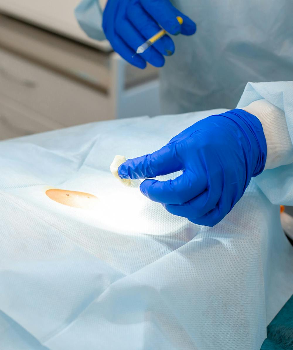 Doctor working  on a patient