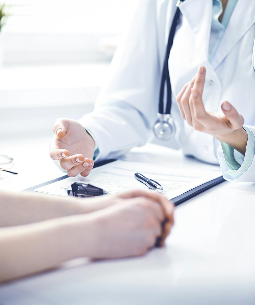 Patient speaking with doctor