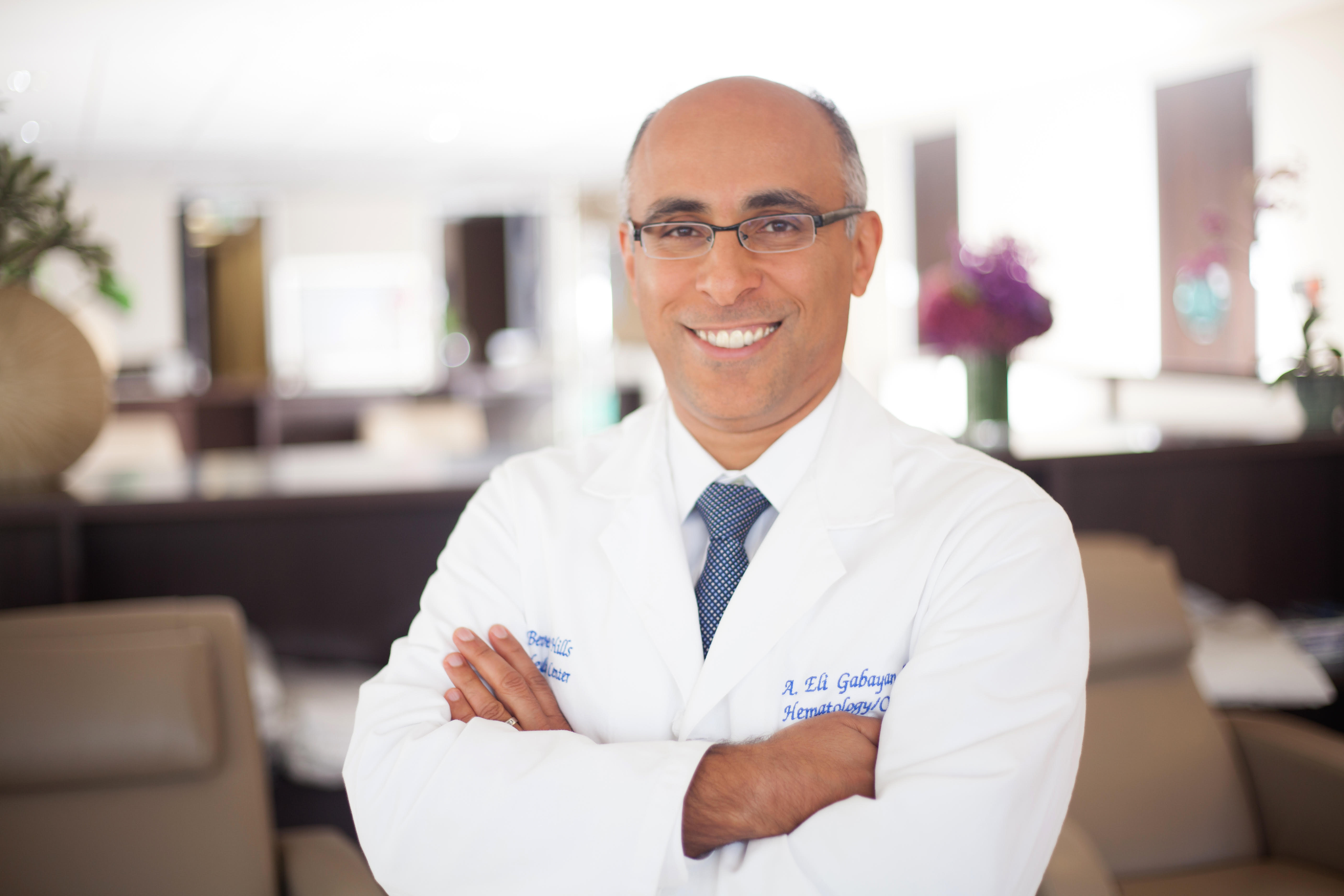 Doctor smiling and looking into the camera
