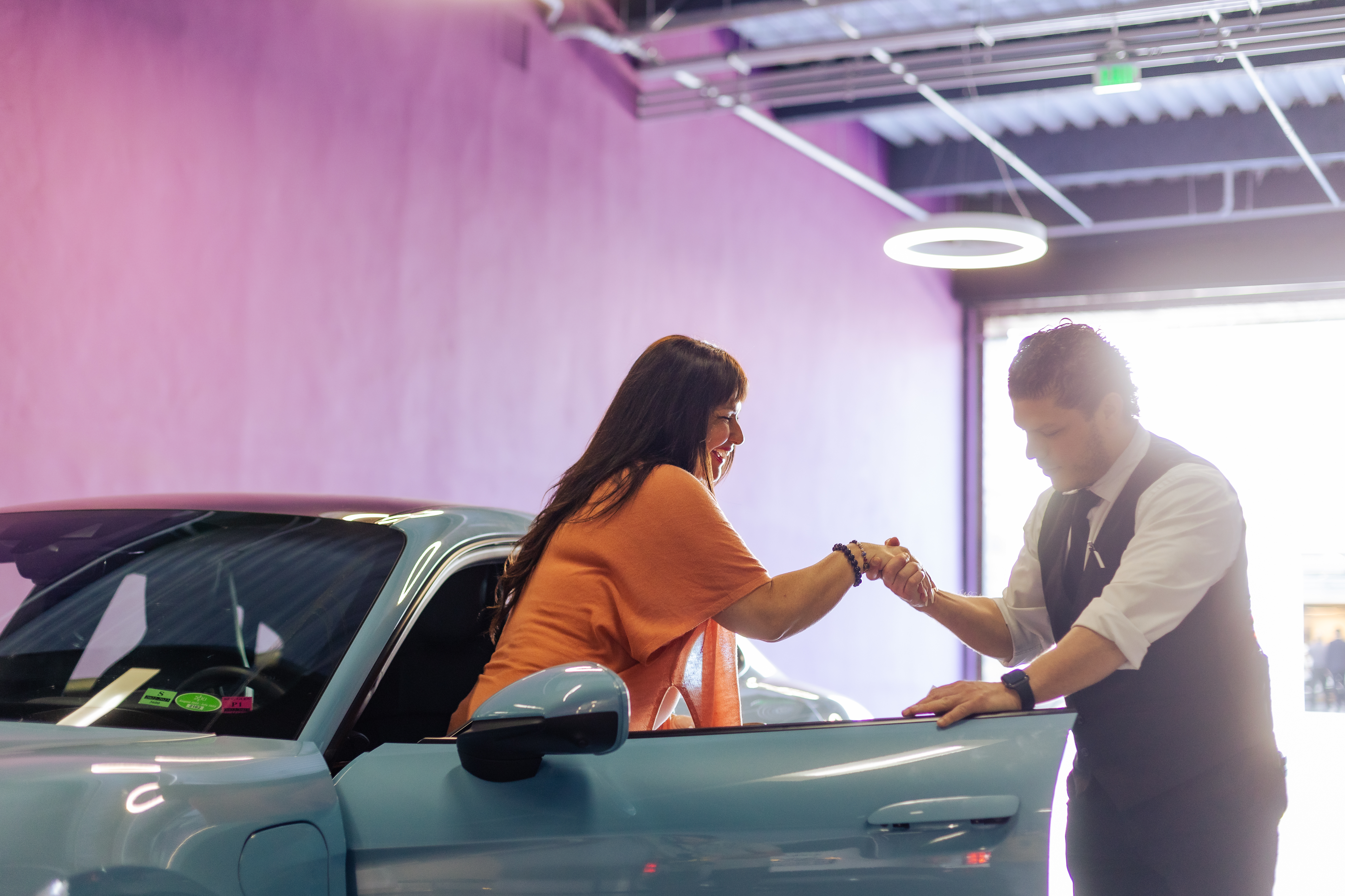 woman getting out of a car