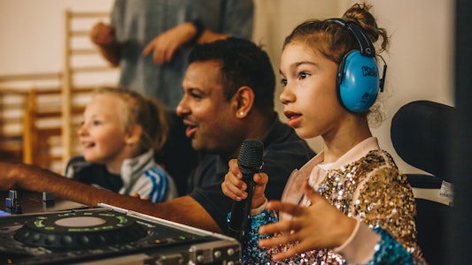 young girl with microphone