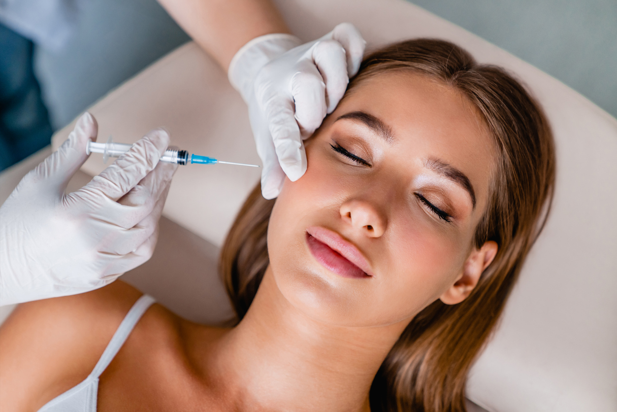 Youthful woman getting an injectable treatment