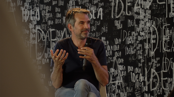 Christoph Rauscher speaking to the audience during Q and A session