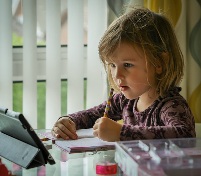 Girl learning from home (image by Carl Jorgensen on Unsplash)