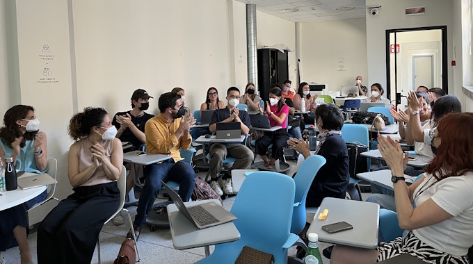 Politecnico Students applauding