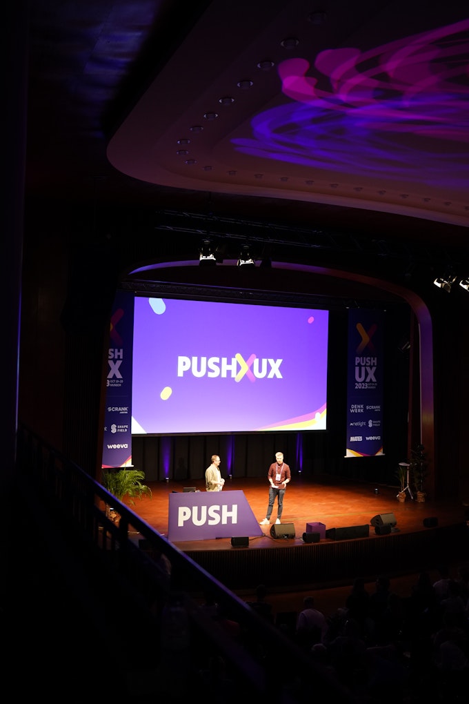 The PUSH UX stage, two people speaking.
