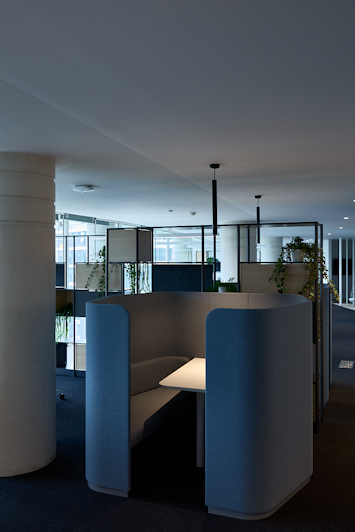 Table surrounded by soundproof panels