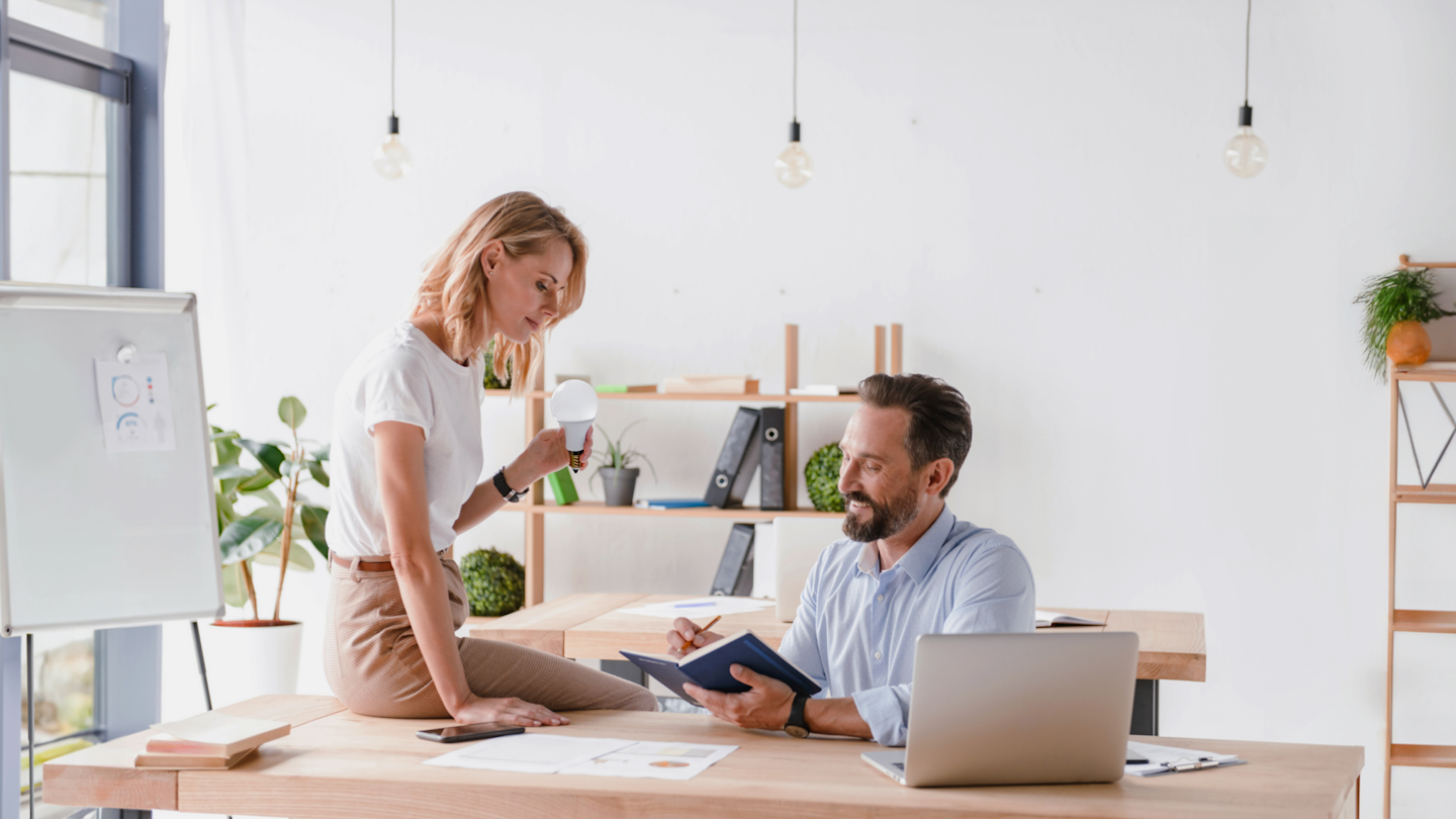 Man and a woman collaborating to work out a solution