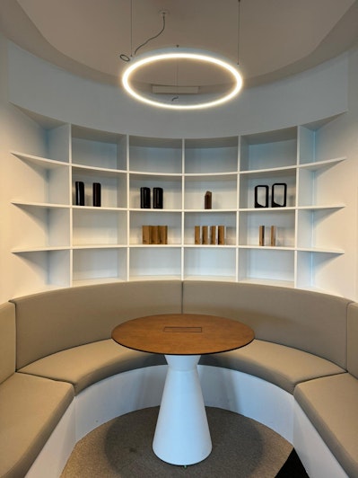 Round table with sofas and library