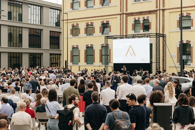 Outdoor stage and audience at the award ceremony