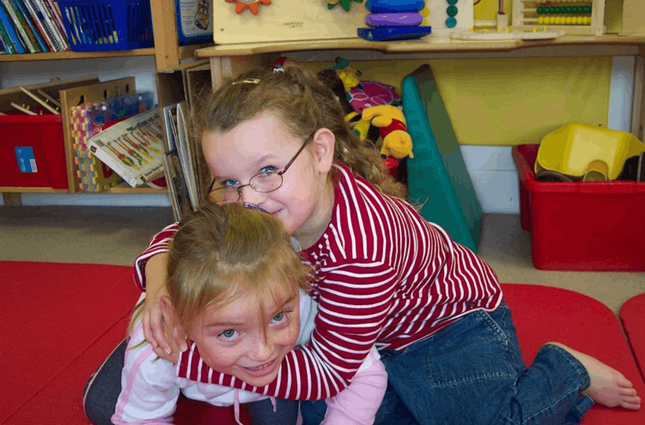 Ellen and Emily (wearing glasses) aged 4 at Stick ‘n’ Step