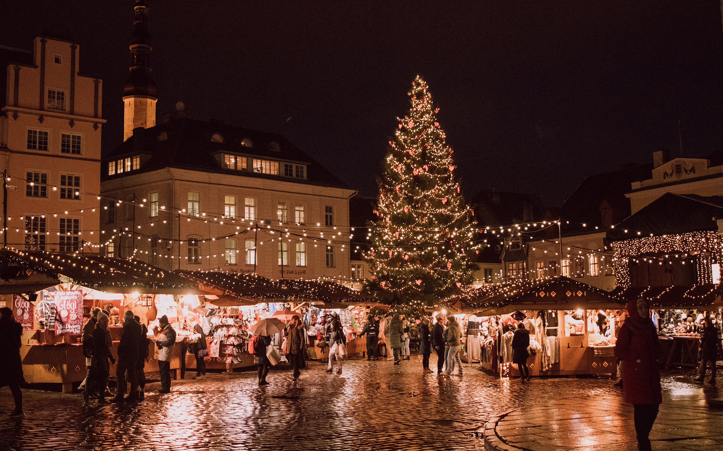 Holiday festival in city square at night