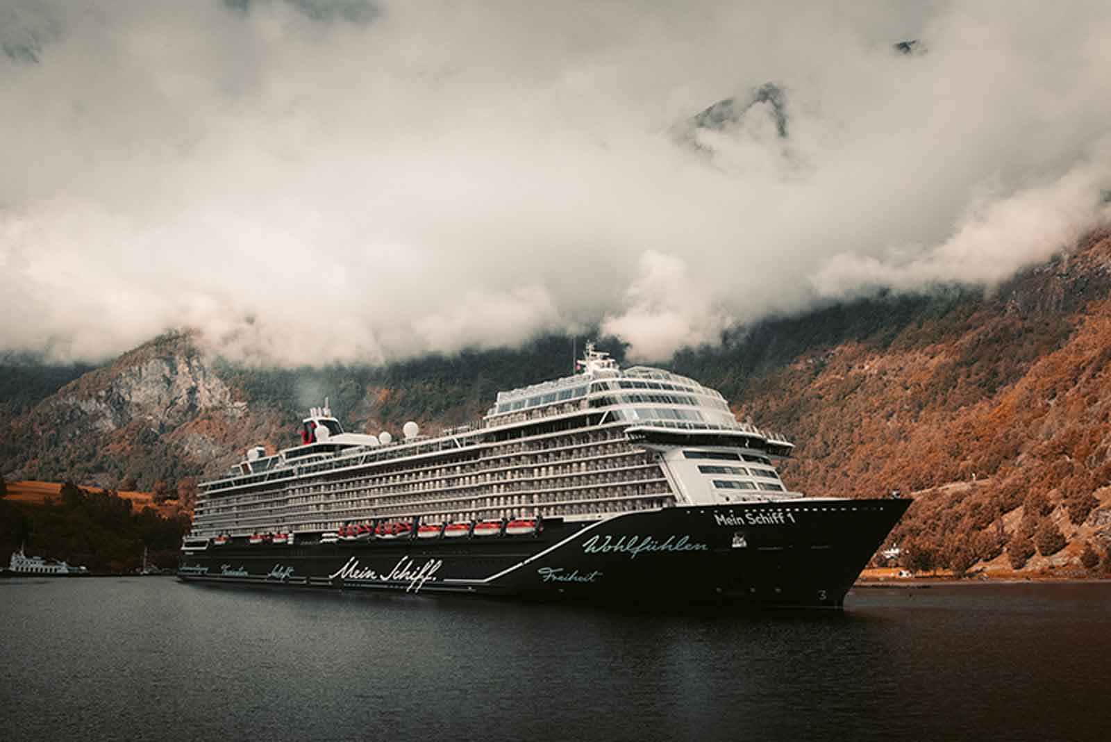 Cruise ship under heavy clouds