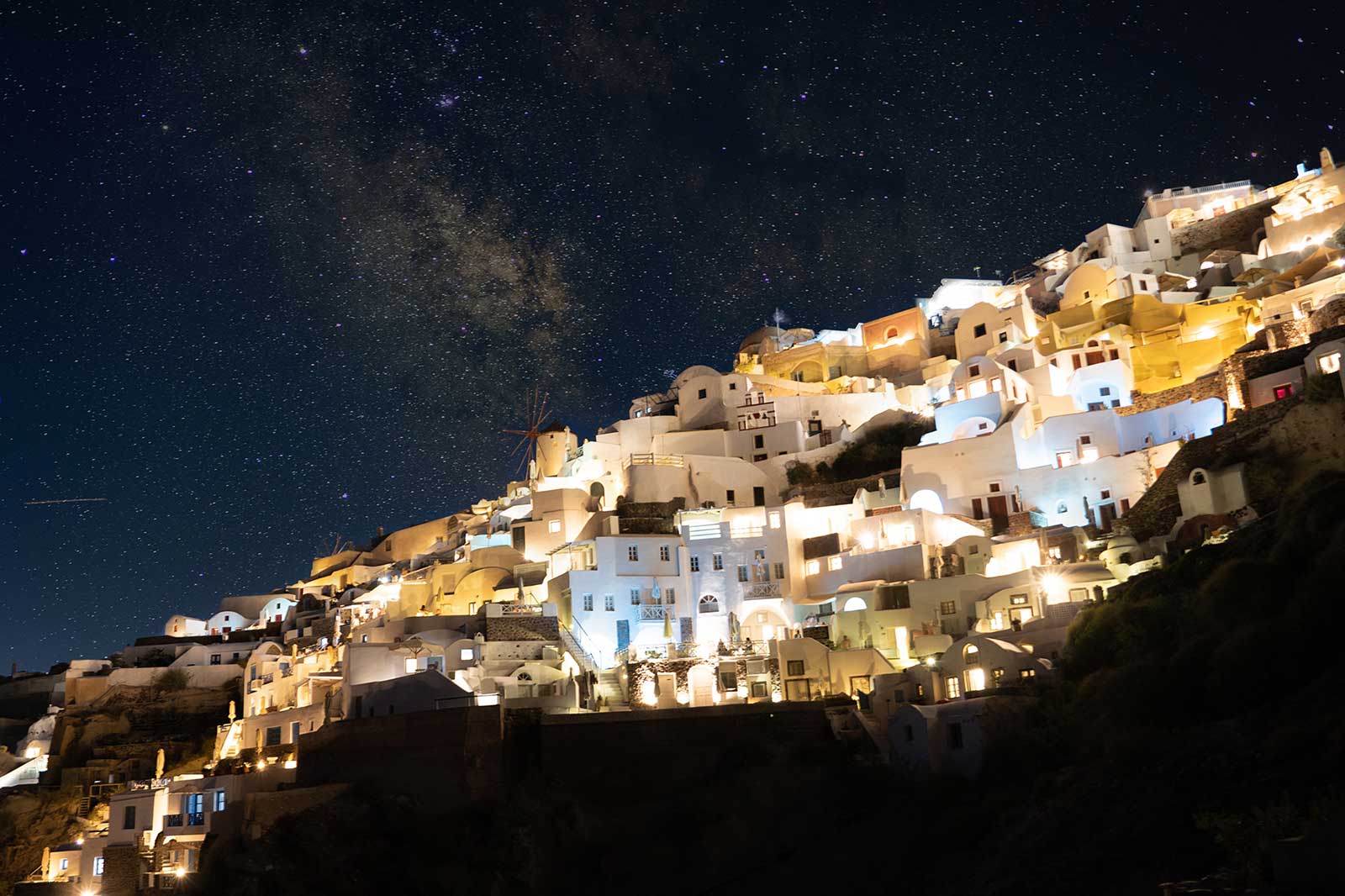 Greek town lit up at night