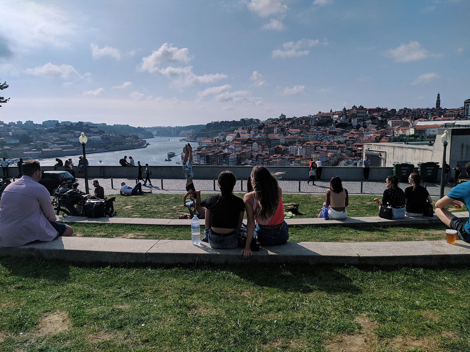 Groups of young people sitting in park