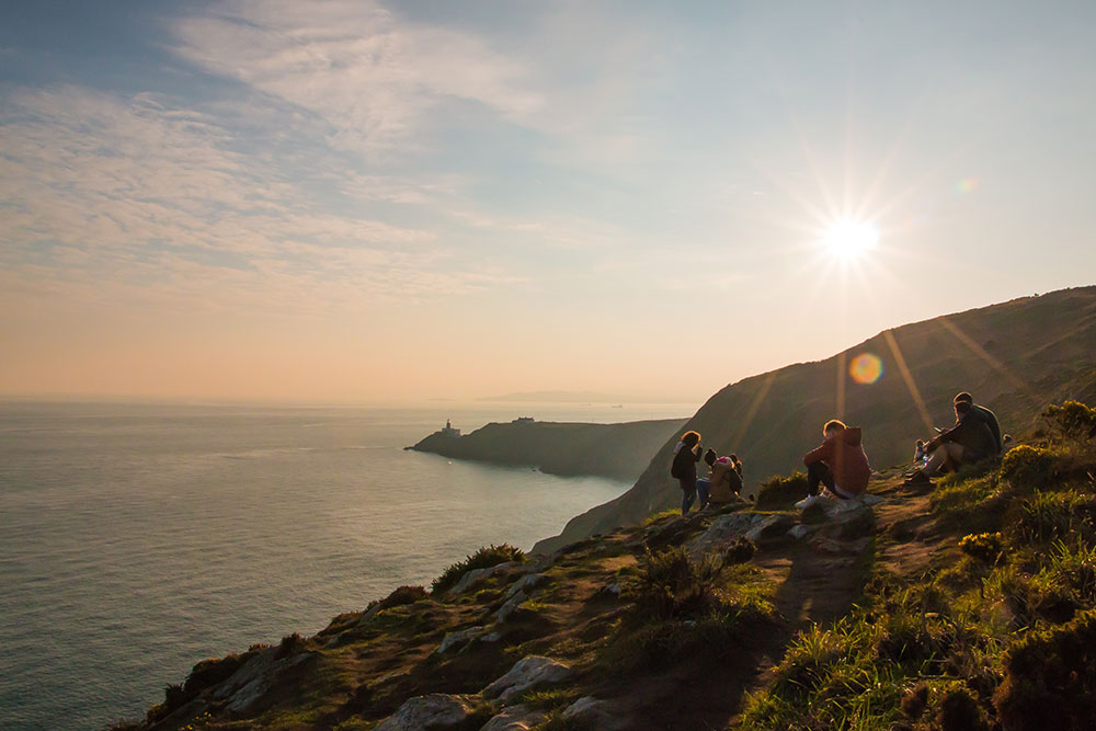 Group resting on a hill in the morning