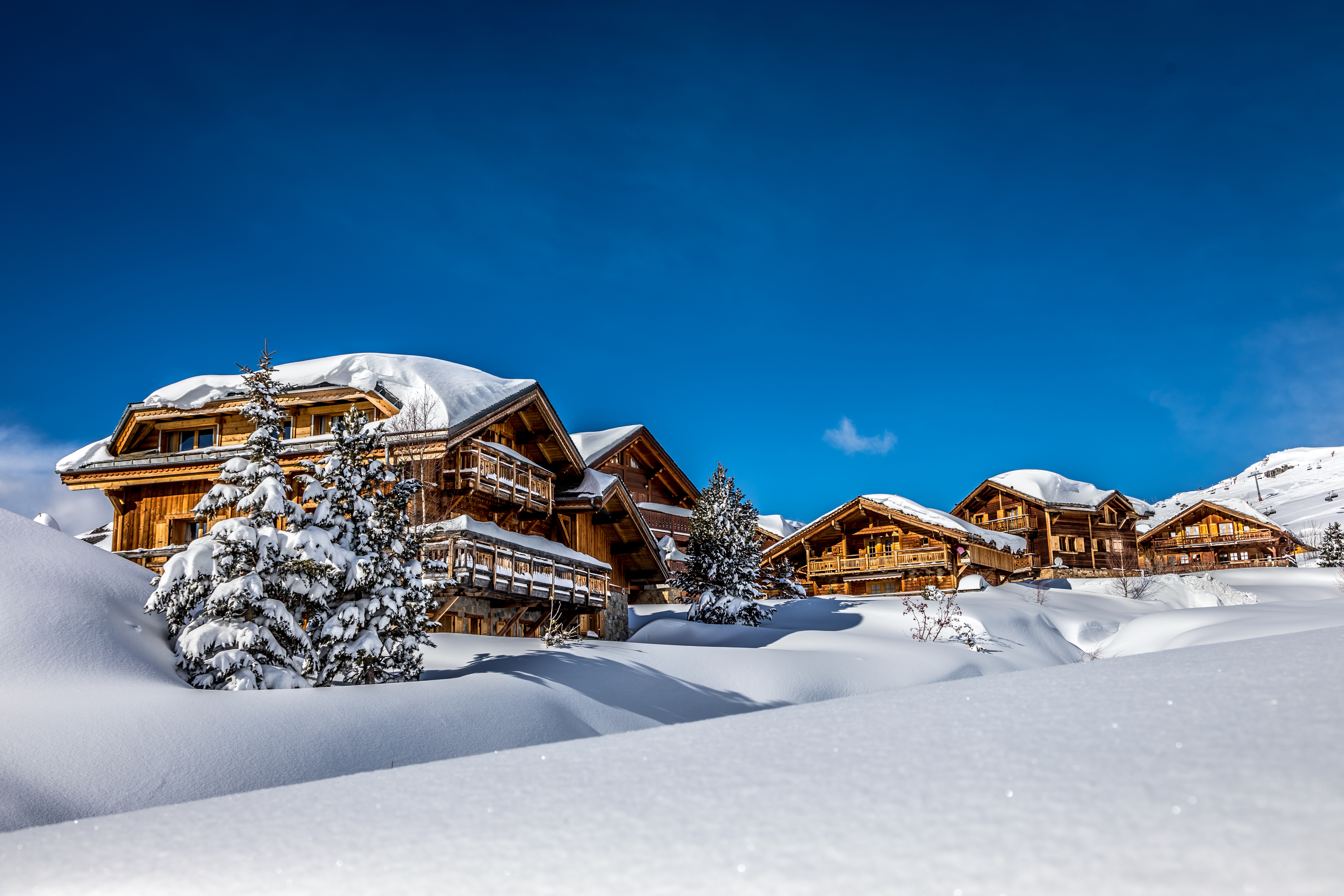 Ski lodge buildings partialy burried in snow