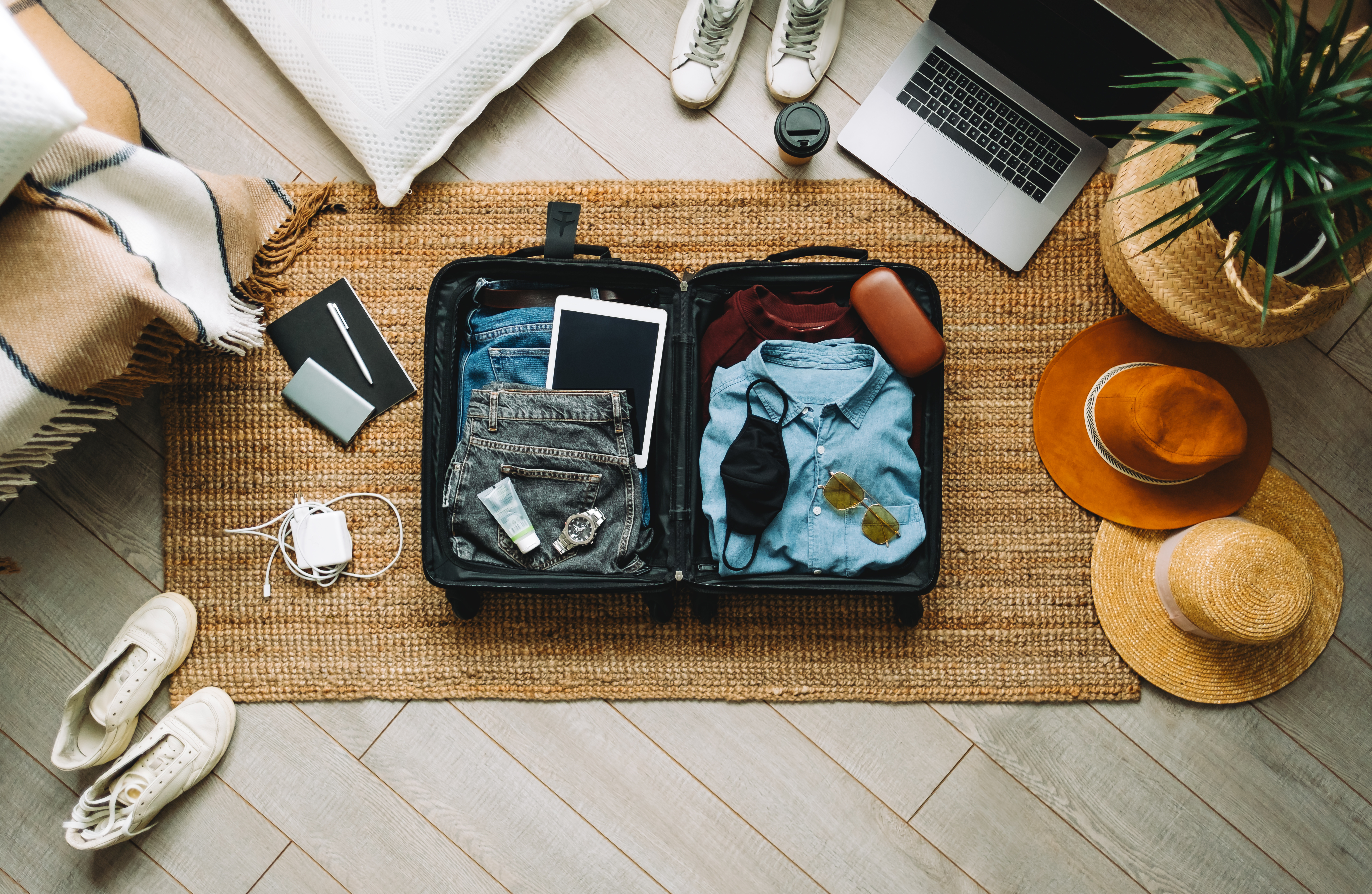 Open suitcase being packed