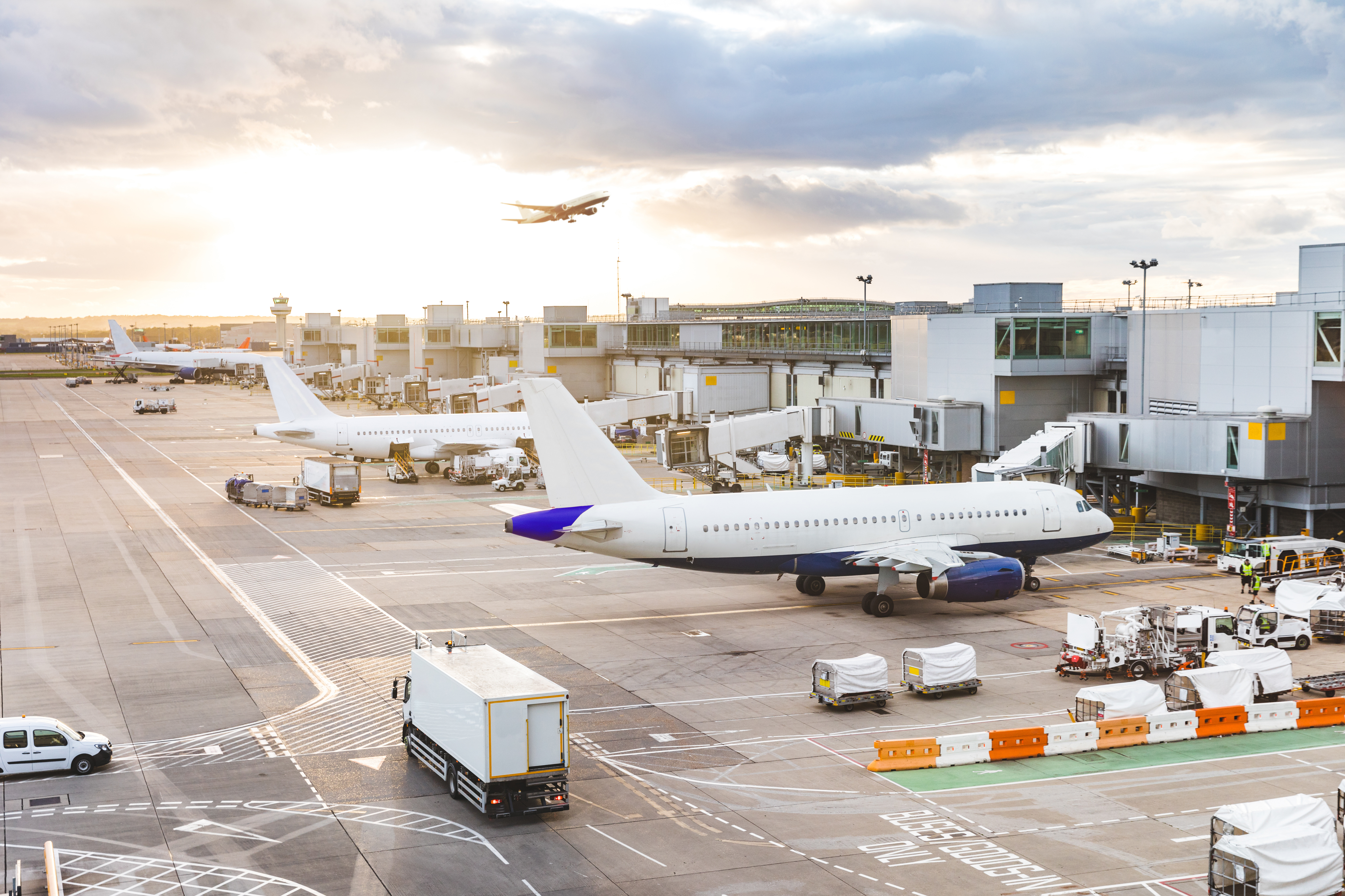 Outside airport terminal planes parked at gates