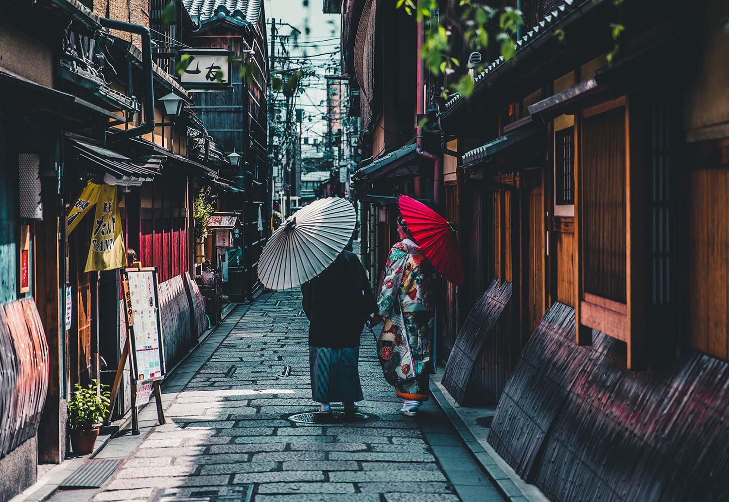 Two people on traditional Japanese street