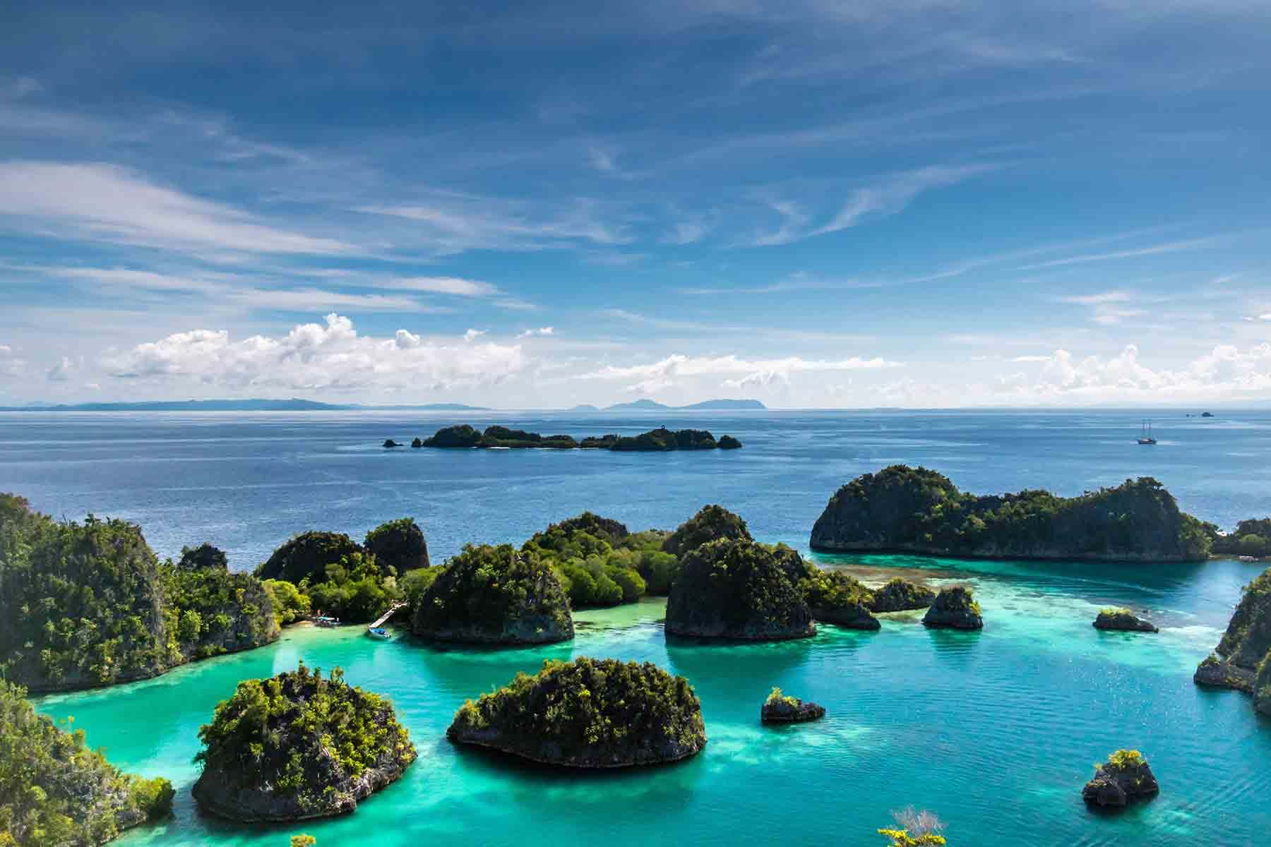 Small green islands in blue water