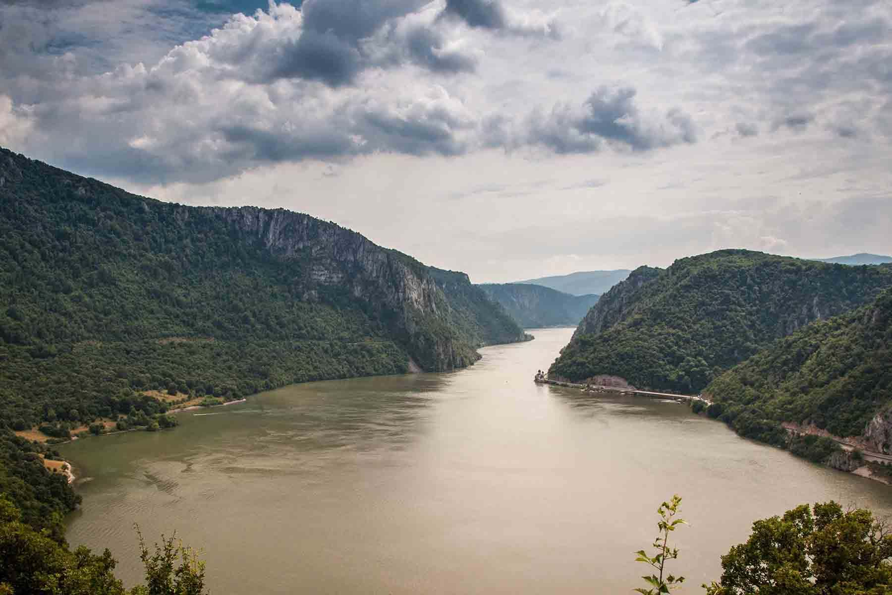 River surrounded by lush mountians