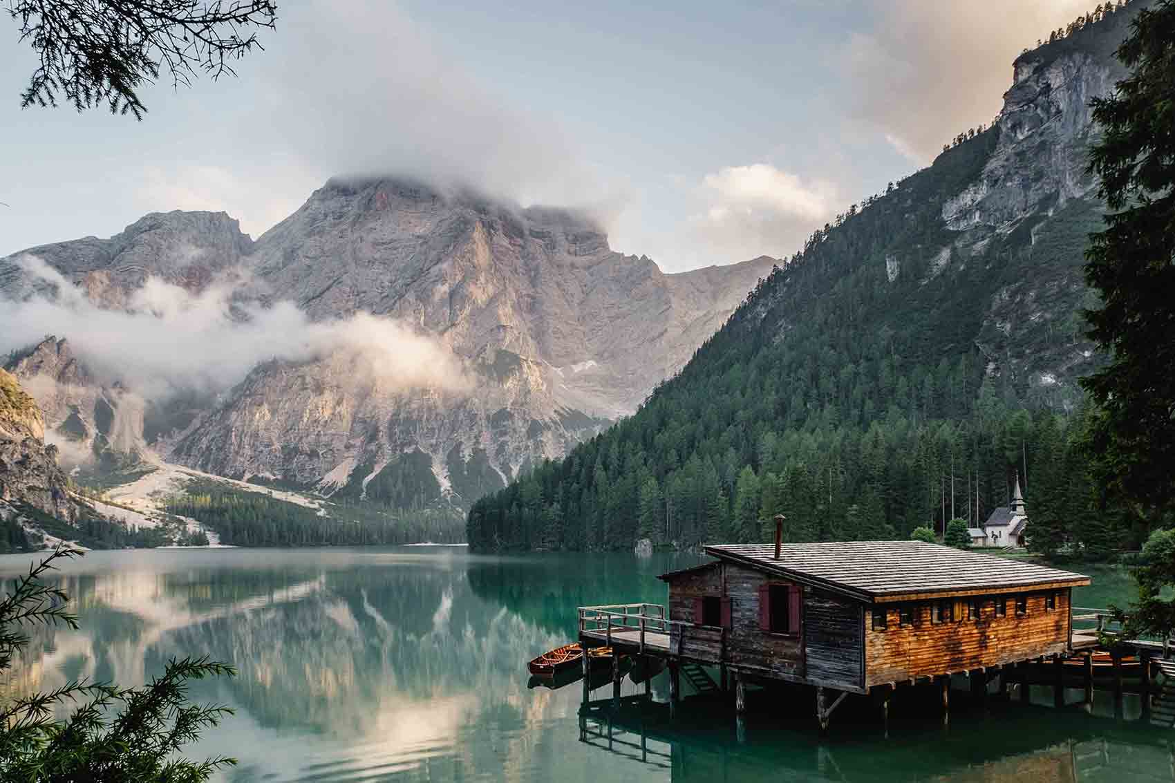 Fishing cabin on lake in the mountains 