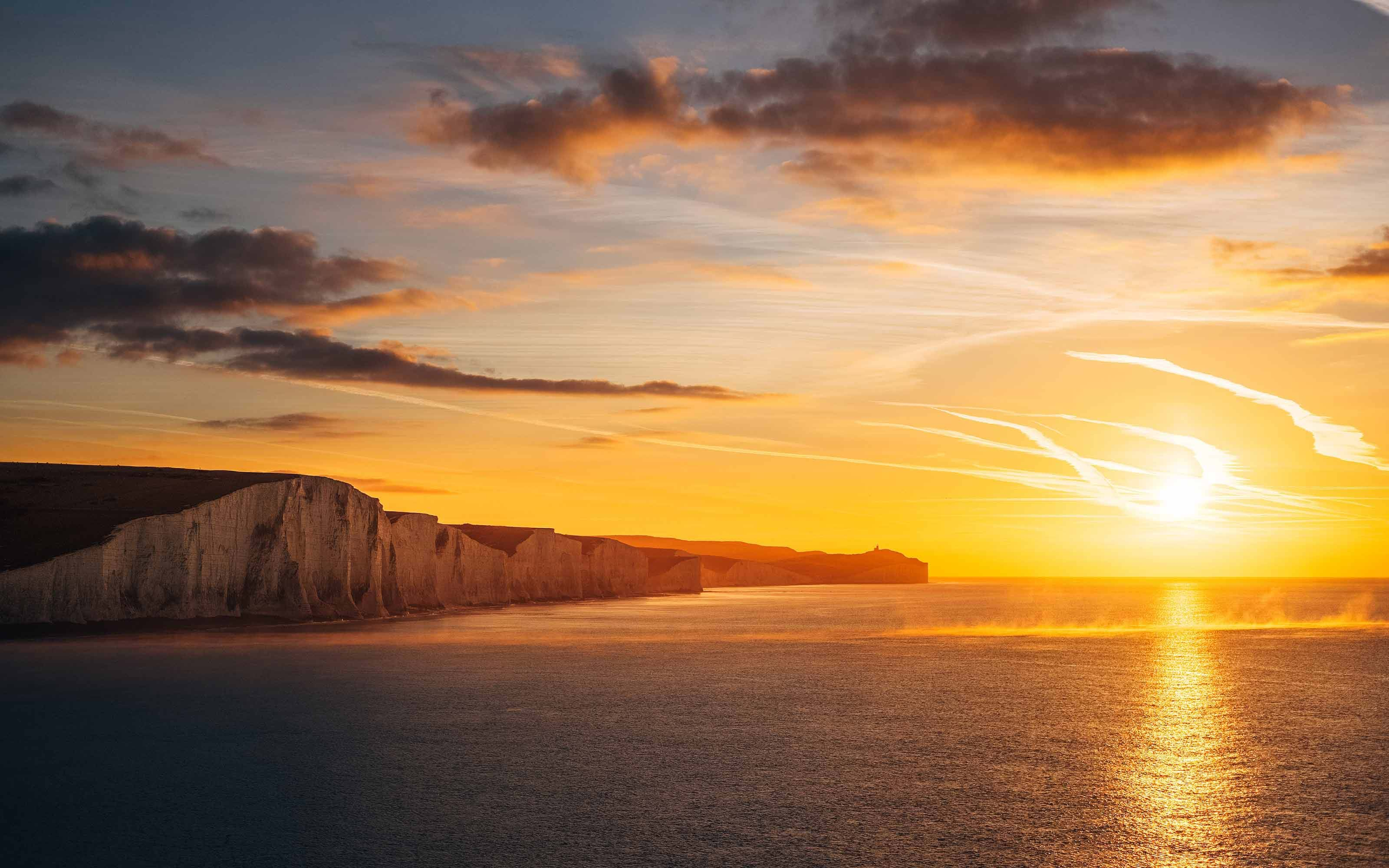 Coastal cliffside at sunset