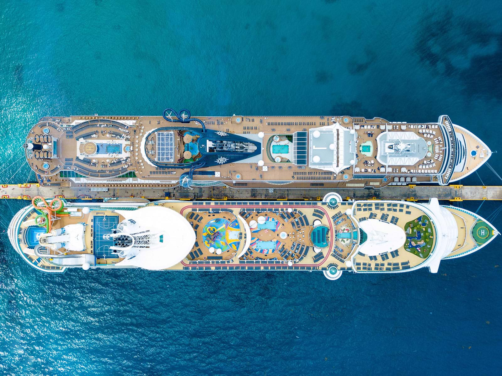 Top decks of two docked cruise ships