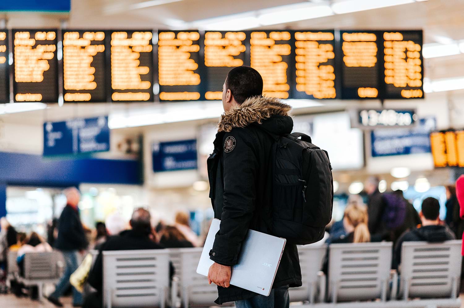 Traveler making their way through crowded airport