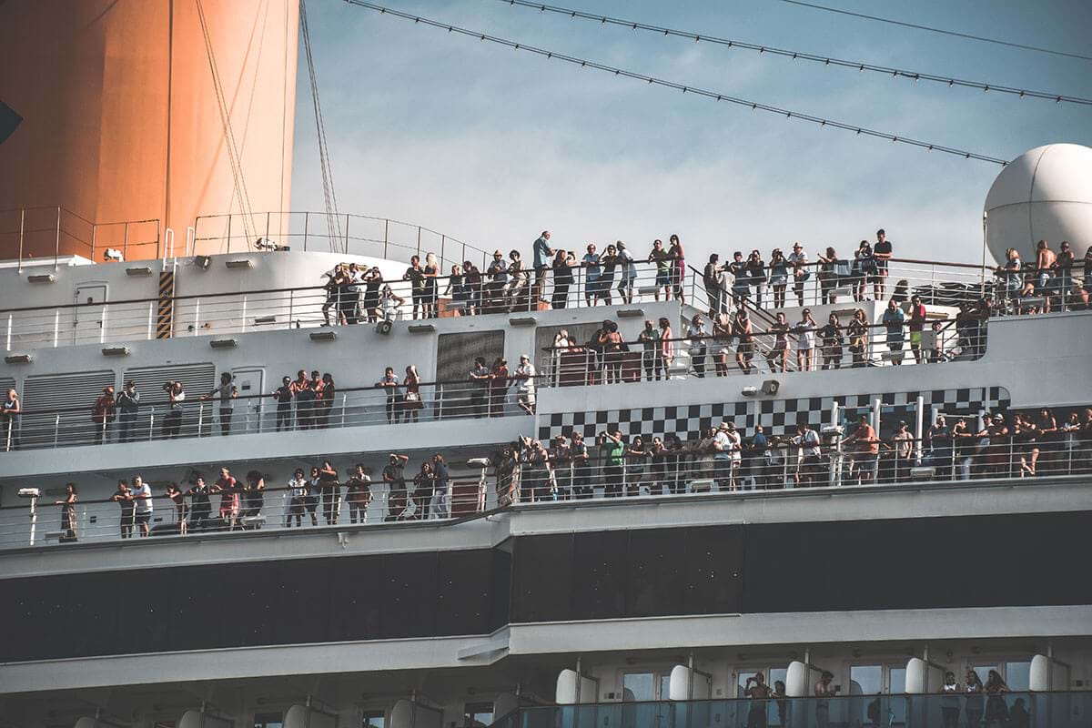 Passengers gathered on decks of cruise ship