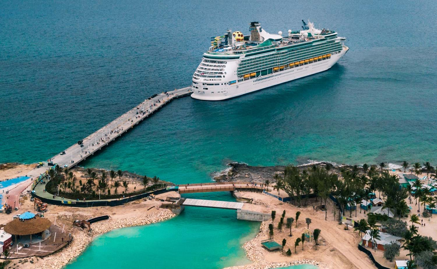 Cruise ship leaving port at tropical destination