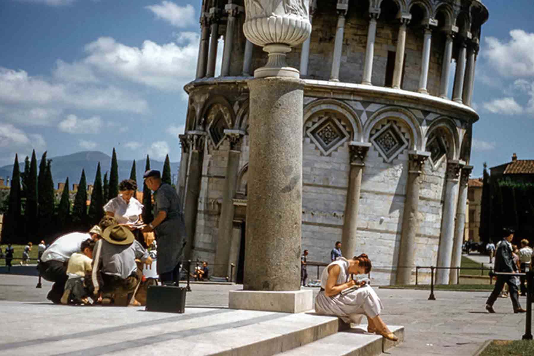 Tourists a base of Leaning Tower of Pisa