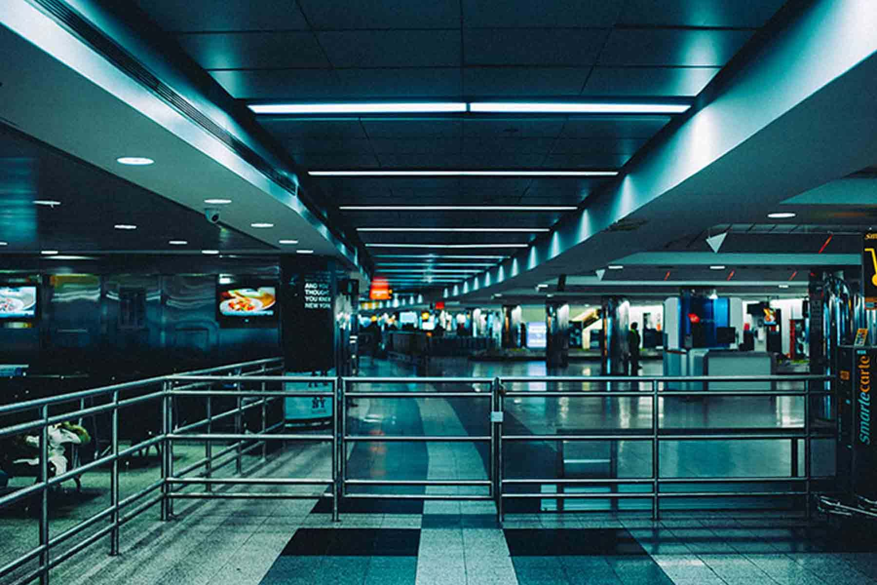 Cool lit interior airport corridor