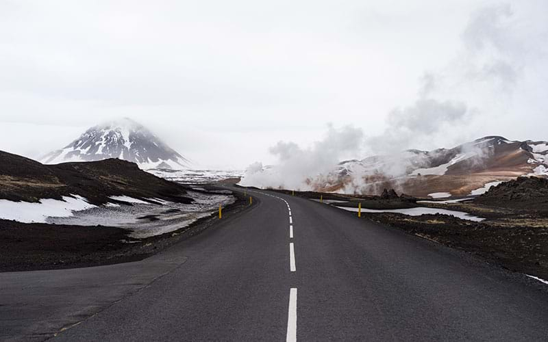 Road heading through tundra