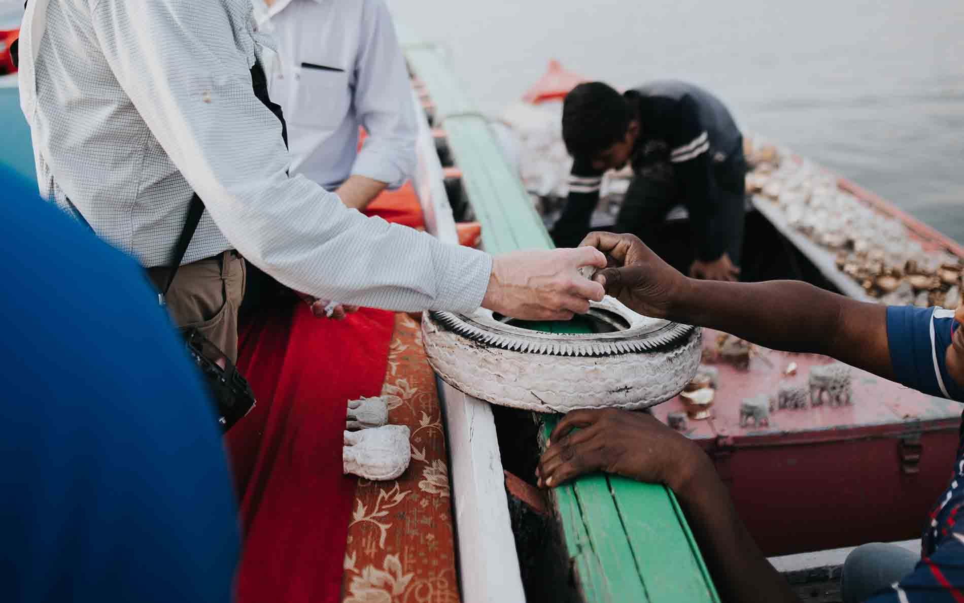 Locals sell ceramic figurines to tourists