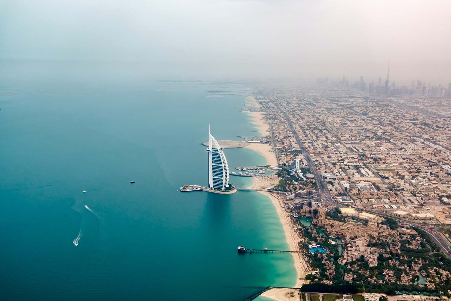 Large expanse of city on coast of Dubai