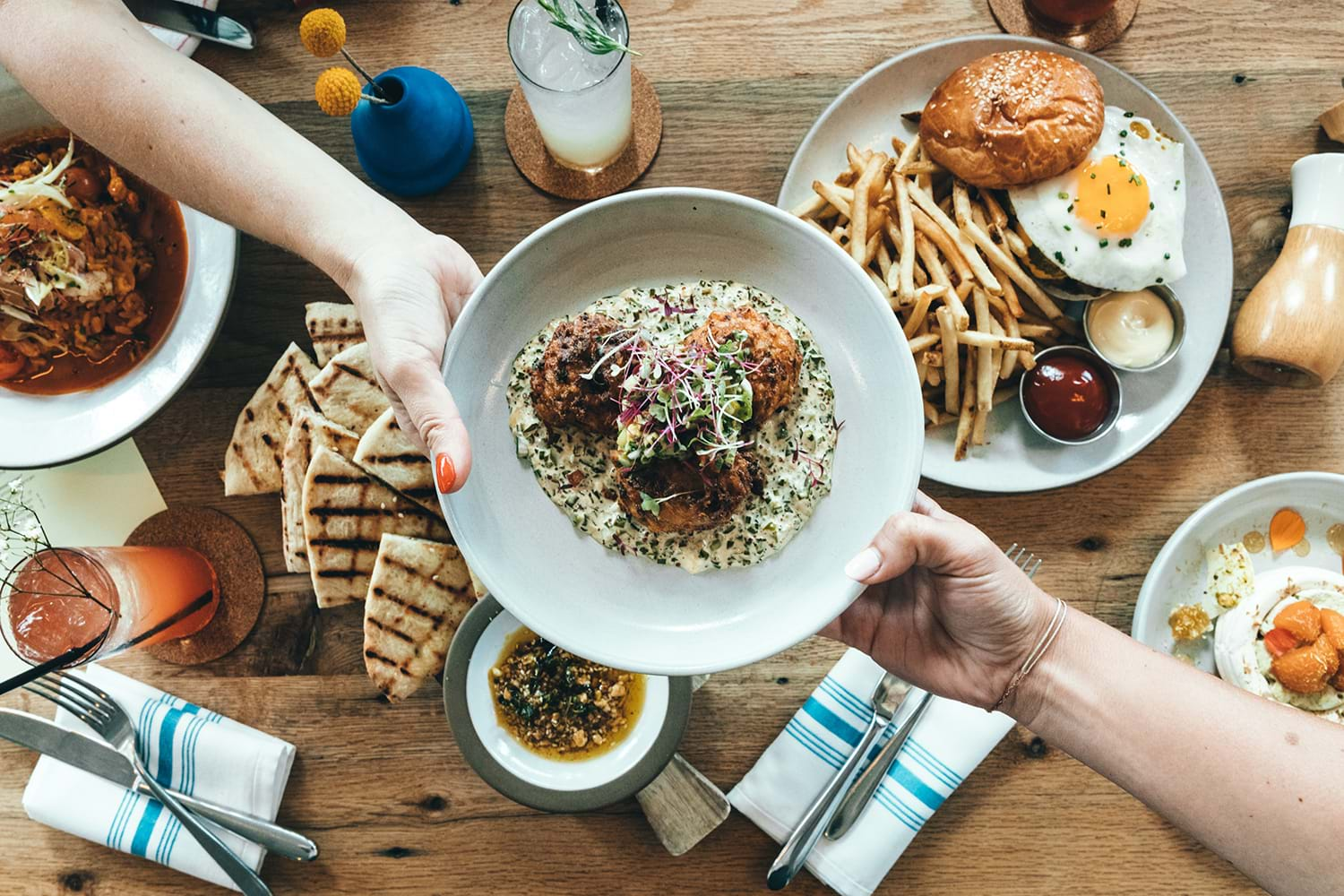 People sharing large meal