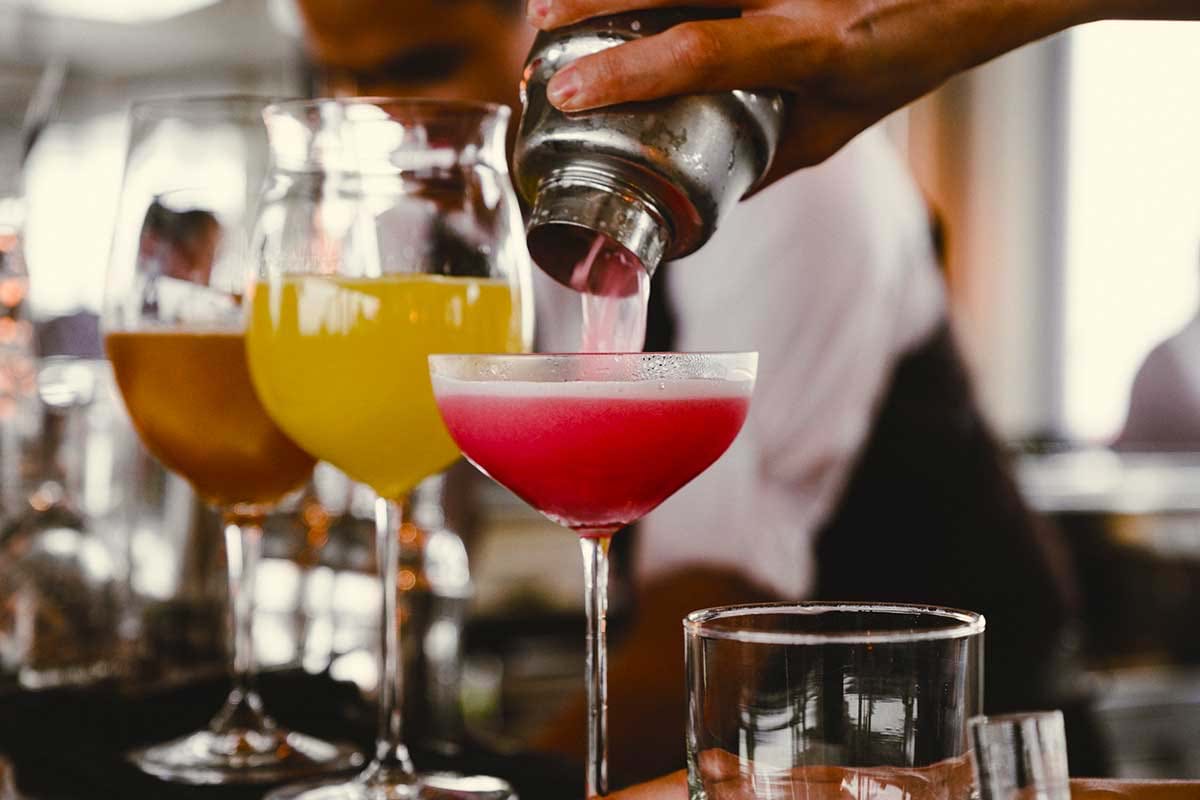 Pouring colorful drinks