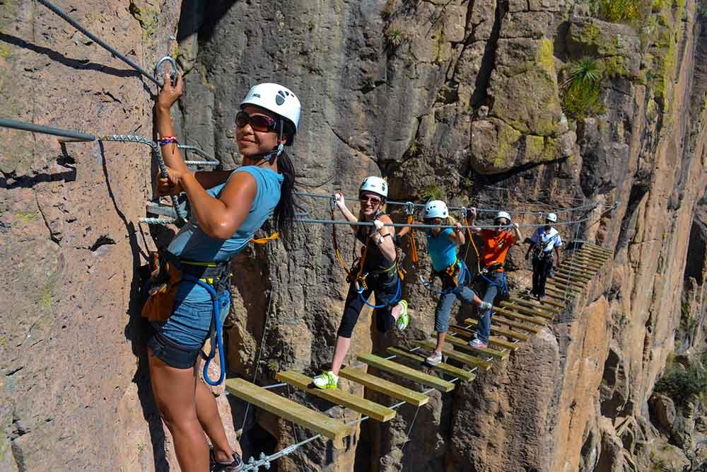 Photo of people on guided rock mountain adventure in Copper Canyon, Mexico